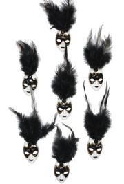 White and Black Plastic Doll Face Pin with Black Feathers 