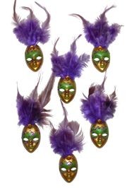 4in Tall x 1 1/4in Wide Purple/ Green/ Gold Plastic Doll Face Magnet w/Purple Feathers 